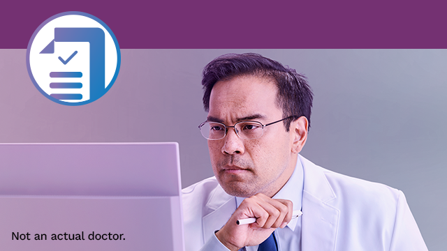 A health care professional wearing a white coat and glasses, holding a pen while looking at a monitor with a circular checklist icon at the top-left corner, with a purple-blue background. Text indicates he is not an actual doctor.